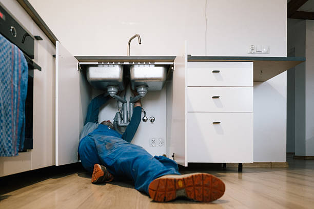 Professional Plumbing technician working in Oakhurst, CA